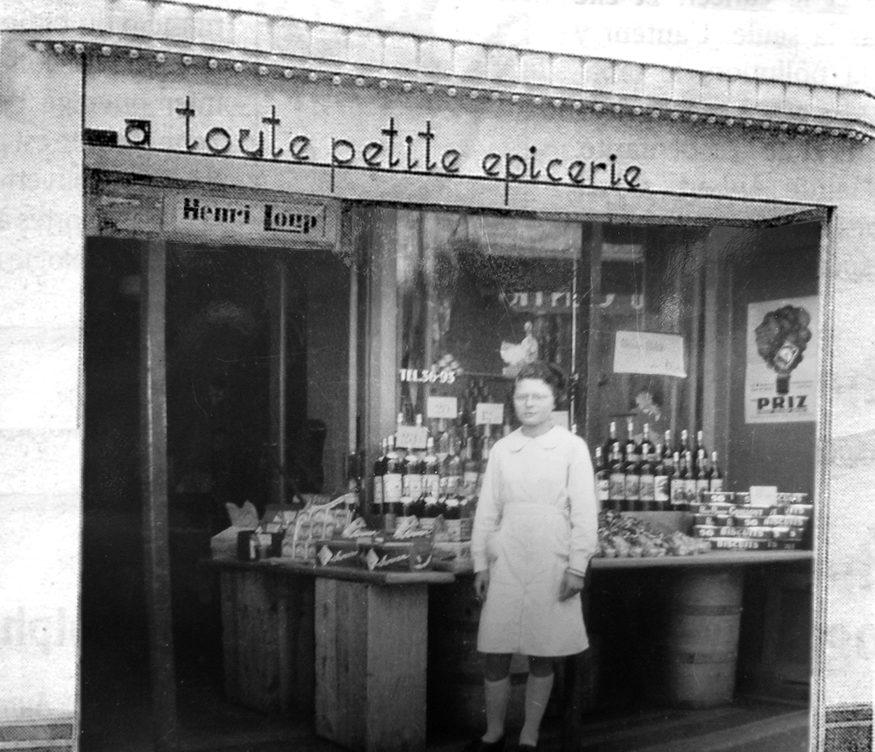 la petite épicerie de notre grand père , rue Sainte Catherine à Orléans avec sa fille qui travaillait à la boutique (notre future maman)